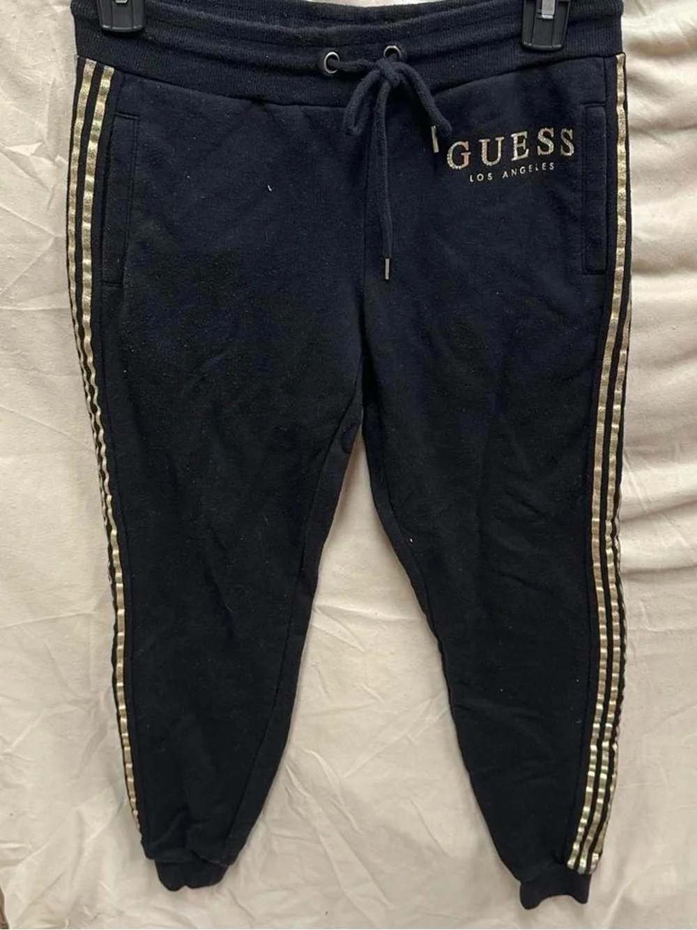 GUESS black and gold with rhinestones sweat pants.
